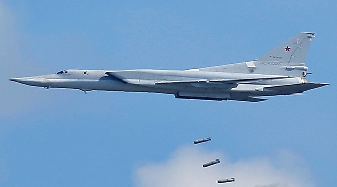 24h qua ảnh: Oanh tạc cơ Nga dải “mưa bom” diệt phiến quân IS - Ảnh 3.