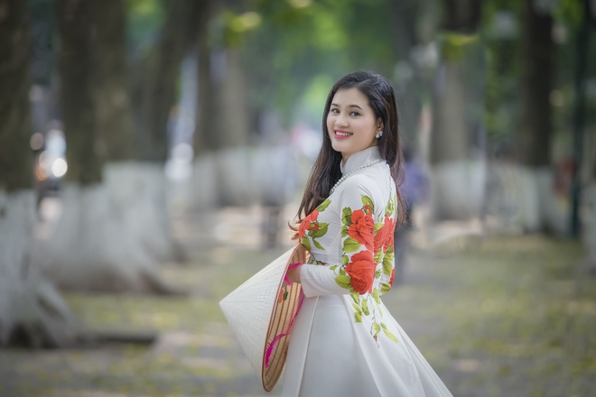 Sự thật thú vị về bức ảnh người con gái Việt xinh đẹp mặc áo dài - Ảnh 1.