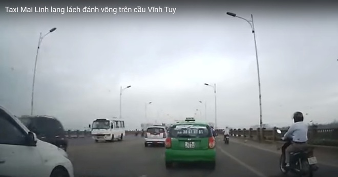 Phạt 7,5 triệu đồng tài xế taxi đánh võng trên cầu Vĩnh Tuy - Ảnh 1.