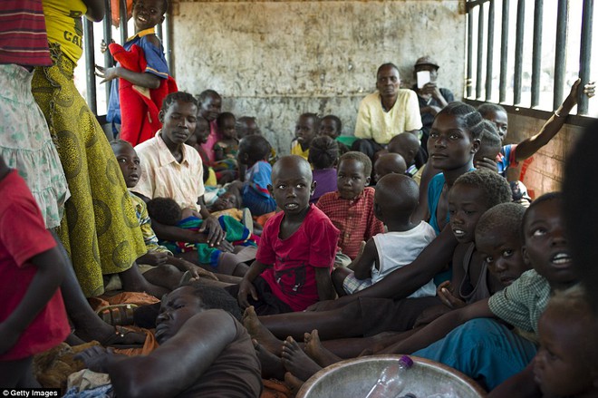 Chiến tranh liên miên, người dân Nam Sudan phải ăn cỏ dại và rong để sống qua ngày - Ảnh 13.