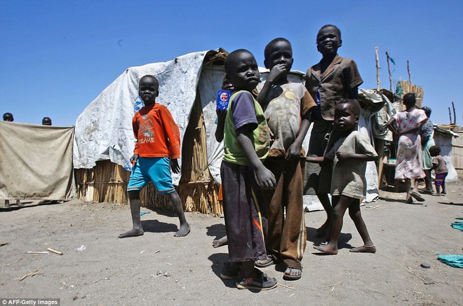 Chiến tranh liên miên, người dân Nam Sudan phải ăn cỏ dại và rong để sống qua ngày - Ảnh 15.