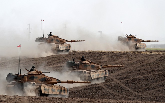 24h qua ảnh: Thổ Nhĩ Kỳ dồn xe tăng tập trận sát Iraq - Ảnh 6.