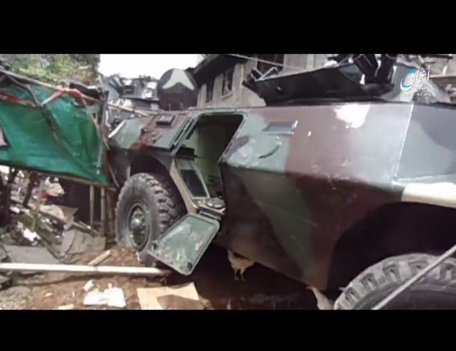Al-Masdar: IS tung video tấn công xe bọc thép, sát hại binh sĩ chính phủ Philippines - Ảnh 1.