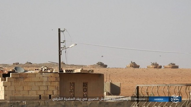 NÓNG: Đau xót, cả đoàn xe tăng QĐ Syria lọt bẫy, bị IS hủy diệt hàng loạt ở Đông Hama - Ảnh 1.