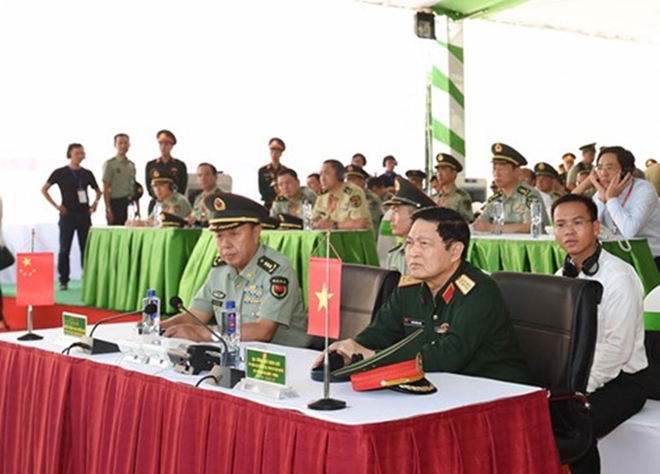 Quân đội Việt Nam và Trung Quốc phối hợp tổ chức diễn tập liên hợp chống khủng bố - Ảnh 1.