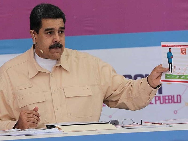 Venezuela dùng tiền ảo để phá vòng vây - Ảnh 1.