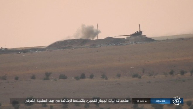 NÓNG: Đau xót, cả đoàn xe tăng QĐ Syria lọt bẫy, bị IS hủy diệt hàng loạt ở Đông Hama - Ảnh 4.