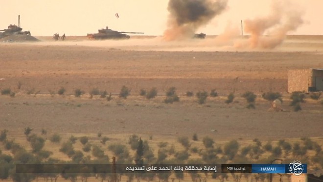NÓNG: Đau xót, cả đoàn xe tăng QĐ Syria lọt bẫy, bị IS hủy diệt hàng loạt ở Đông Hama - Ảnh 6.