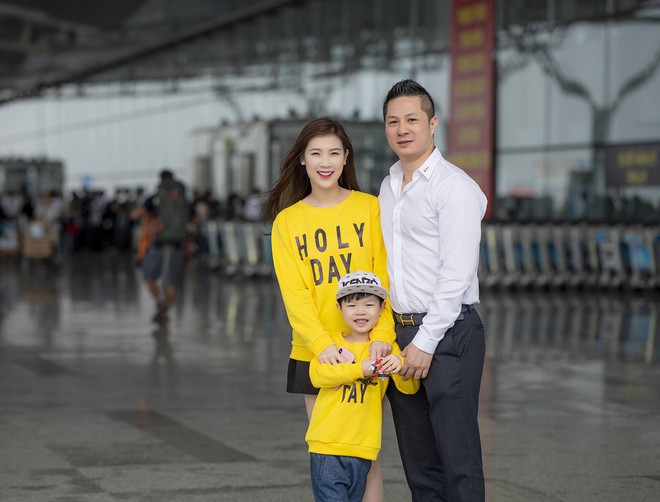 Hoa hậu Phí Thùy Linh và con trai mặc nổi bật tại sân bay - Ảnh 4.