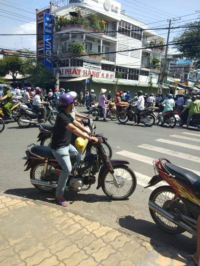 Kẻ cướp gần 500 triệu đồng giữa ban ngày ở Mỹ Tho từng làm công cho người bị hại - Ảnh 1.