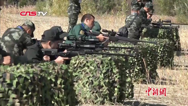 Sức mạnh súng bắn tỉa hiện đại của Cảnh sát cơ động Việt Nam thi đấu tại Trung Quốc - Ảnh 2.