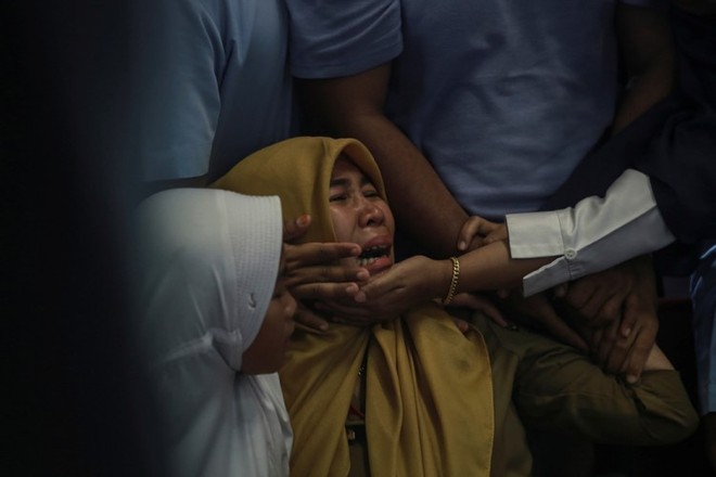 Thực hư bức ảnh em bé duy nhất sống sót trên chuyến bay định mệnh ở Indonesia đang lan truyền chóng mặt trên MXH - Ảnh 1.