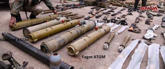 Quân đội Syria phát hiện hàng chục đầu đạn tên lửa S-75 và S-125 của “quân nổi dậy” ở Daraa - Ảnh 13.
