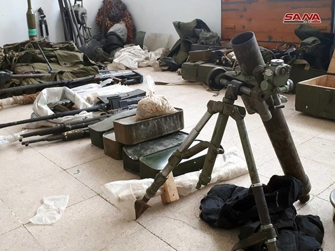 Quân đội Syria phát hiện hàng chục đầu đạn tên lửa S-75 và S-125 của “quân nổi dậy” ở Daraa - Ảnh 4.