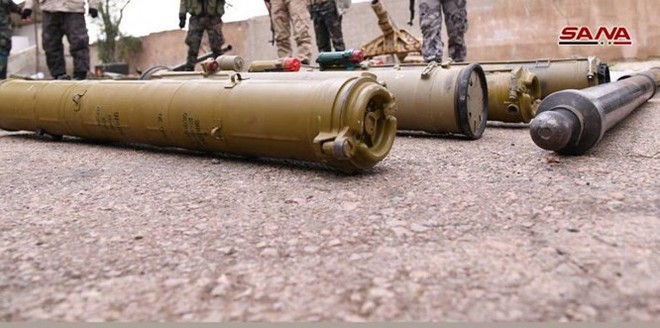 Quân đội Syria phát hiện hàng chục đầu đạn tên lửa S-75 và S-125 của “quân nổi dậy” ở Daraa - Ảnh 7.