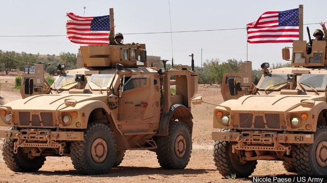 Lý do sâu xa sau việc Mỹ bất ngờ rút quân tại Syria, “trút” trách nhiệm chống IS cho Nga và Iran - Ảnh 1.