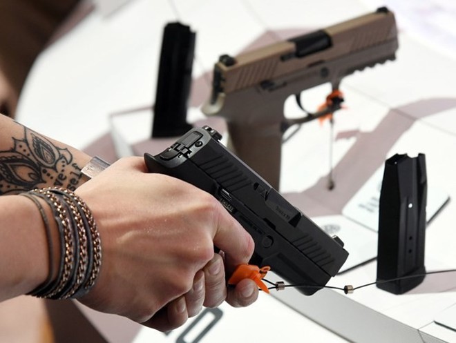 Những khẩu súng đáng sợ nhất tại triển lãm vũ khí SHOT - Ảnh 12.