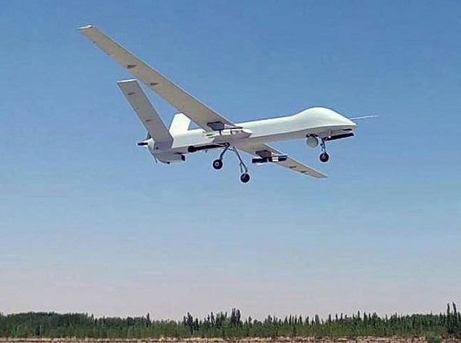 Trung Quốc thử nghiệm cho UAV CH-4 bắn đạn thật - Ảnh 1.