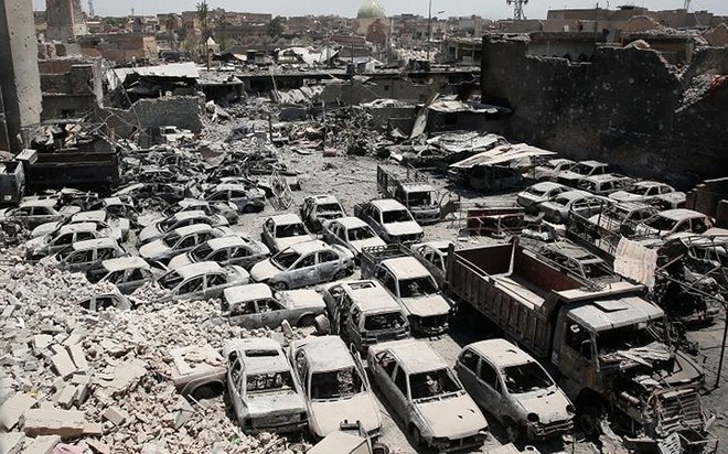 Mosul- “Nấm mồ khổng lồ” bên dưới chiến thắng IS - Ảnh 10.