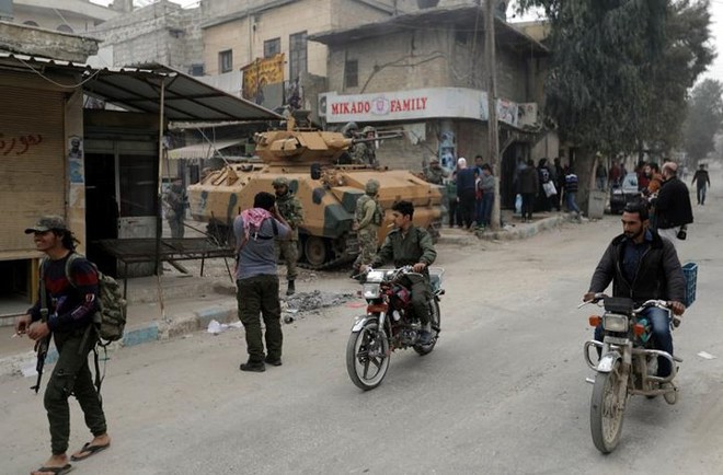 Cận cảnh Thổ Nhĩ Kỳ đánh bại người Kurd, kiểm soát Afrin (Syria) - Ảnh 10.