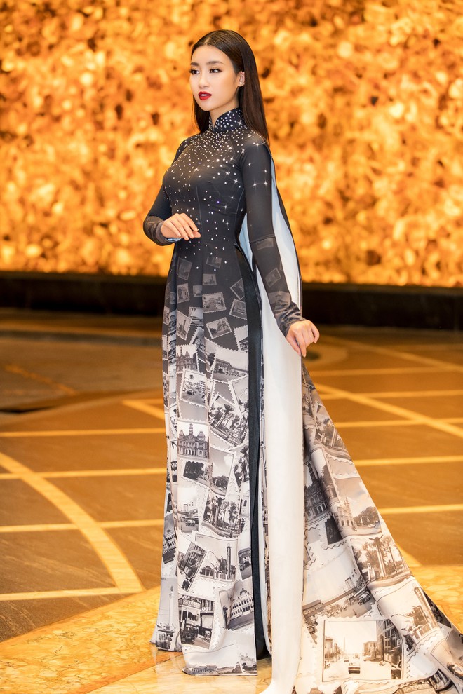 Hoa hậu Đỗ Mỹ Linh gây chú ý khi xuất hiện với tà áo dài 10 mét - Ảnh 7.