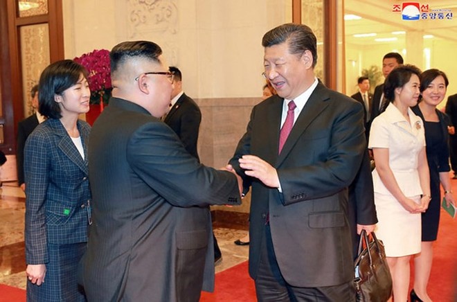 Ảnh: Phu nhân lãnh đạo Triều Tiên Ri Sol-ju đẹp rạng ngời ở Trung Quốc - Ảnh 10.