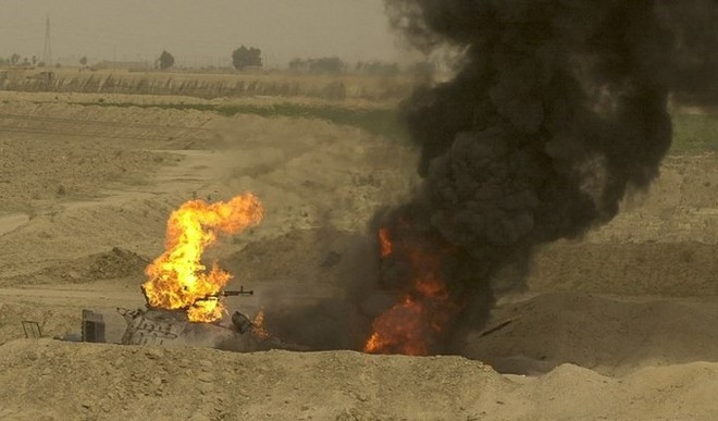 Ám ảnh trận chiến của quân đội Mỹ nhằm lật đổ Tổng thống Iraq Hussein - Ảnh 1.