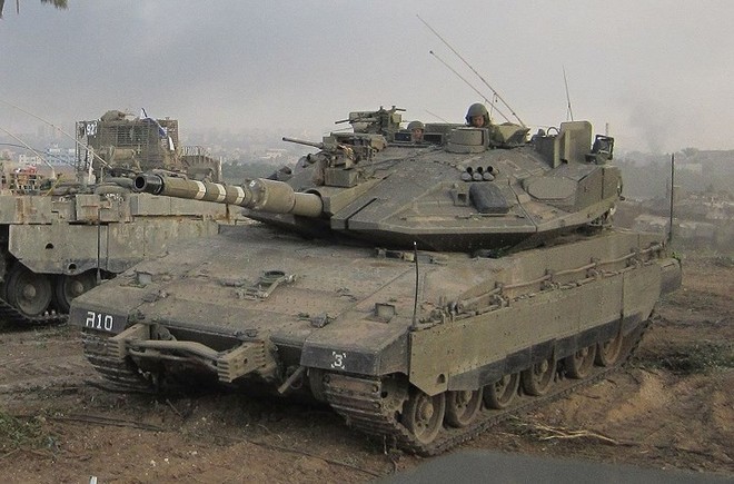 Ảnh: Sức mạnh “vua tăng” Merkava Mk-4 của quân đội Israel - Ảnh 12.