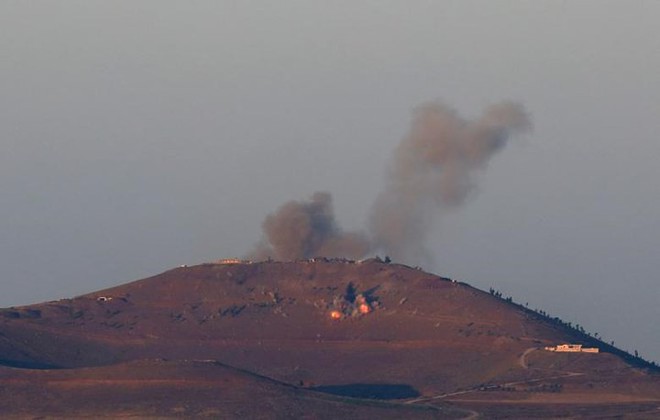 Ảnh: Mưa bom bão đạn rực cháy khu vực biên giới Syria-Israel - Ảnh 3.