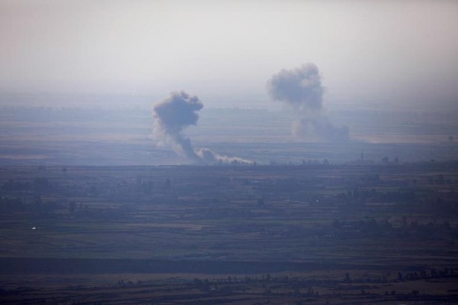 Ảnh: Mưa bom bão đạn rực cháy khu vực biên giới Syria-Israel - Ảnh 4.