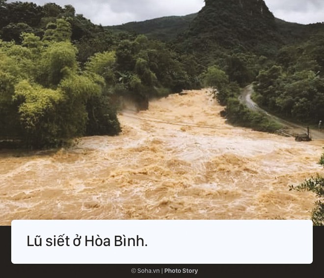 [Photo Story] Cảnh phố như sông ở nhiều tỉnh thành sau cơn bão số 3 - Ảnh 4.