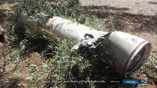Xuất hiện những hình ảnh đầu tiên về máy bay chiến đấu Su-22 Syria bị bắn hạ - Ảnh 4.
