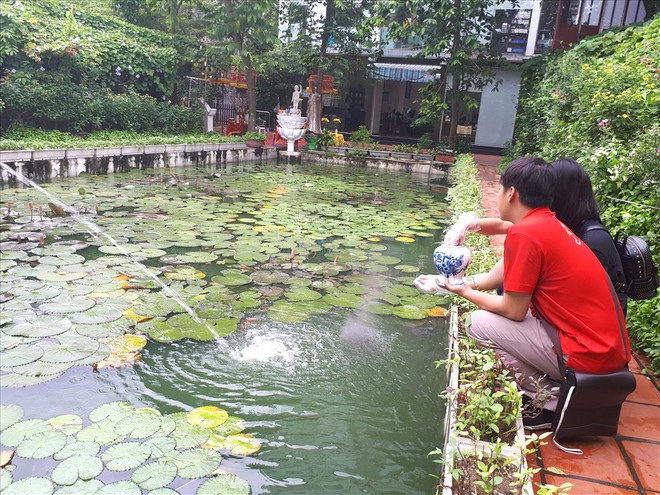 [Chùm ảnh] Dịch vụ an táng cho chó mèo ở Hà Nội: Bỏ chục triệu đầy đủ nghi thức, lễ vật và cầu nguyện - Ảnh 3.