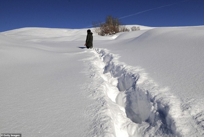Ảnh: Mùa đông khắc nghiệt với tuyết rơi dày ở nhiều nơi trên thế giới - Ảnh 14.