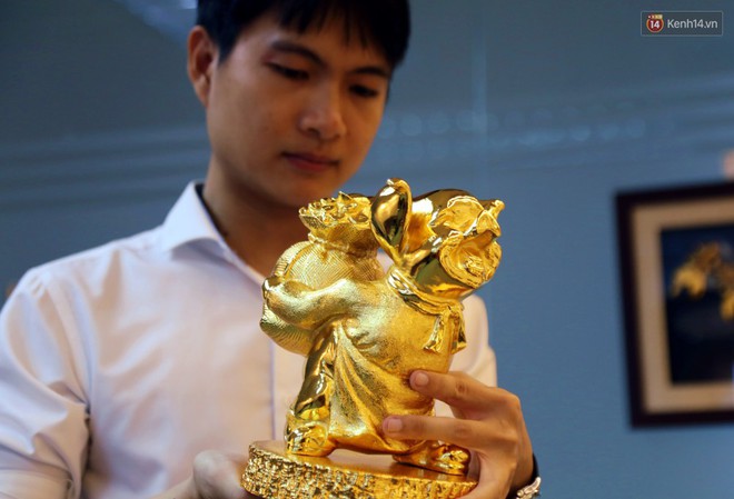 Tượng heo vàng giá hàng trăm triệu đồng được người Sài Gòn săn lùng để chơi Tết Kỷ Hợi 2019 - Ảnh 5.