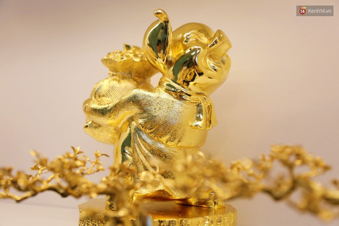 Tượng heo vàng giá hàng trăm triệu đồng được người Sài Gòn săn lùng để chơi Tết Kỷ Hợi 2019 - Ảnh 6.