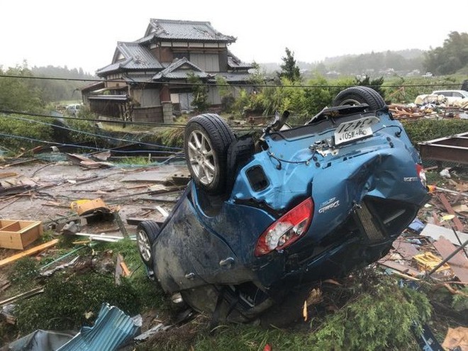 Nhật Bản ngụp lặn trong biển lũ do bão Hagibis - Ảnh 9.