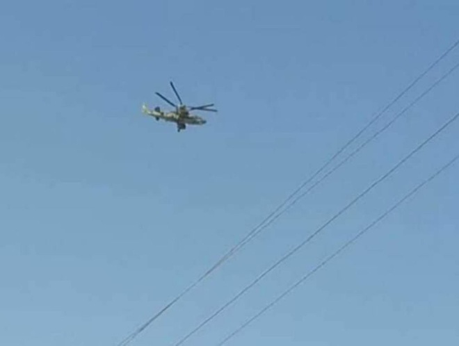 Trực thăng vũ trang Nga truy đuổi máy bay không người lái Mỹ trên bầu trời Syria? - Ảnh 2.