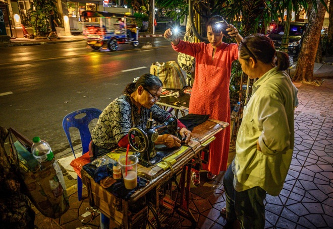 7 ngày qua ảnh: Cặp đôi trượt băng nghệ thuật Nga luyện tập trước giải đấu lớn - Ảnh 11.