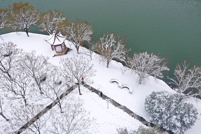 Vẻ đẹp trong trẻo của tuyết mùa xuân ở Trung Quốc khiến nhiều tín đồ du lịch cuồng chân dù đã hết Tết - Ảnh 11.