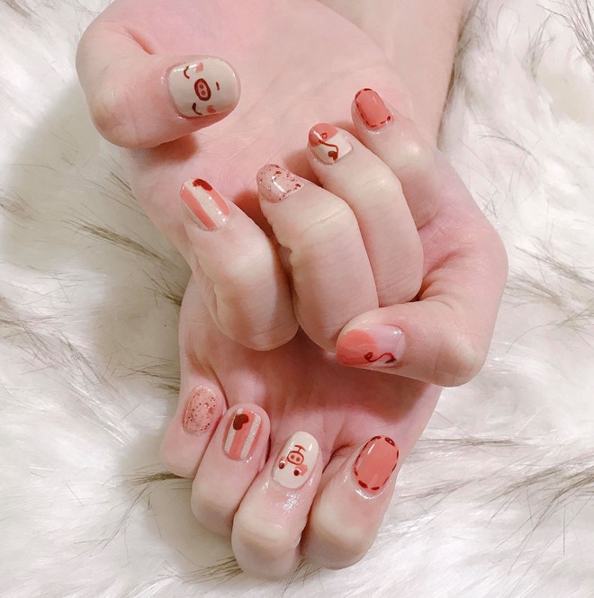 Chùm ảnh: Năm Hợi phải làm nail con heo thì ăn Tết mới ngon - Ảnh 2.