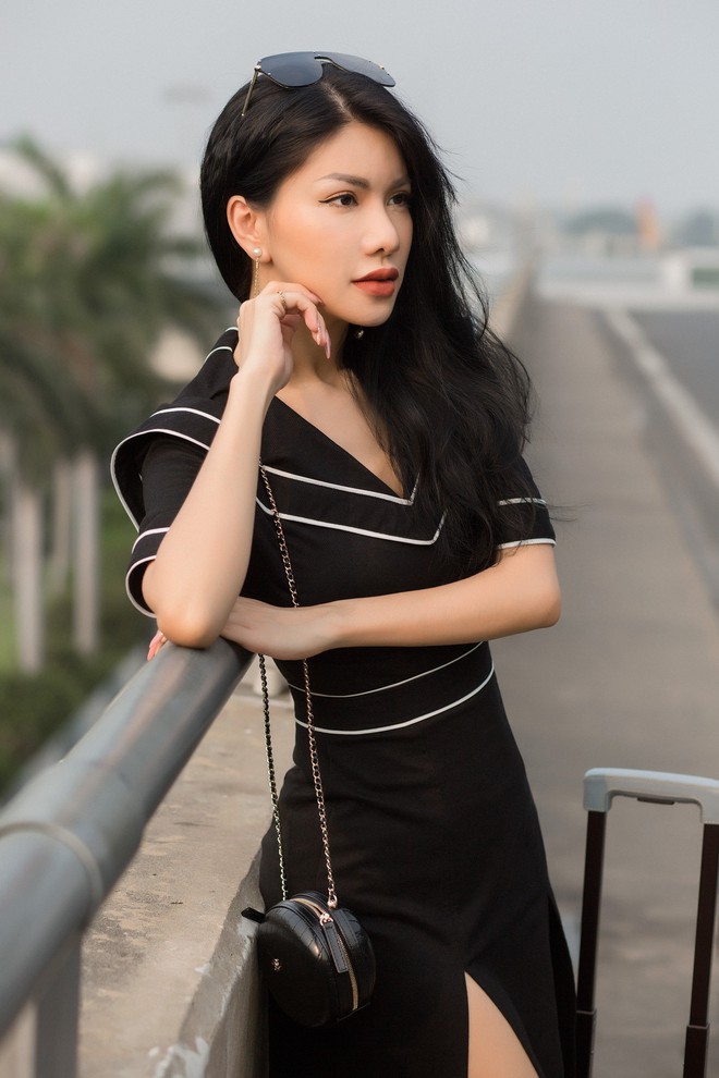 Vẻ quyến rũ khó rời mắt của Hoa hậu đang là tiếp viên hàng không Việt Nam tại sân bay - Ảnh 7.