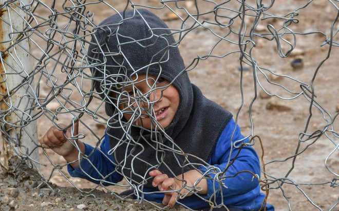 7 ngày qua ảnh: Xe tăng Israel dày đặc gần biên giới với dải Gaza - Ảnh 11.