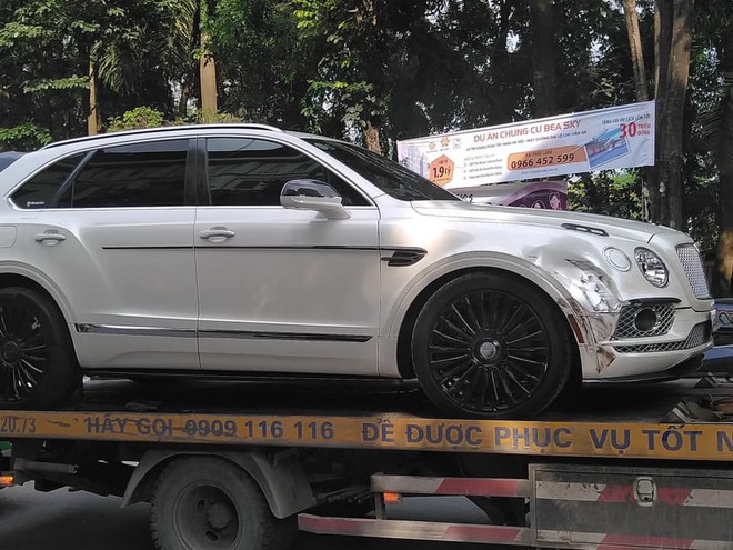 Xe Bentley siêu sang móp đầu, taxi vỡ mũi sau va chạm ở Linh Đàm chiều Chủ Nhật - Ảnh 3.