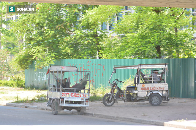 Những giấc ngủ trưa vội vã giữa trời nắng nóng gay gắt như chảo lửa ở Hà Nội - Ảnh 16.