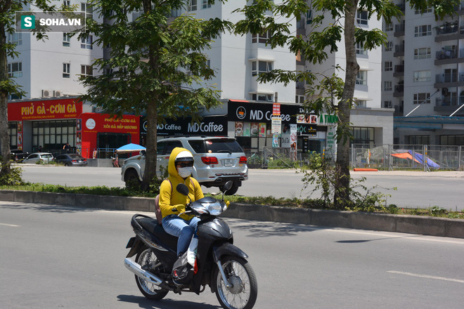 Những giấc ngủ trưa vội vã giữa trời nắng nóng gay gắt như chảo lửa ở Hà Nội - Ảnh 7.