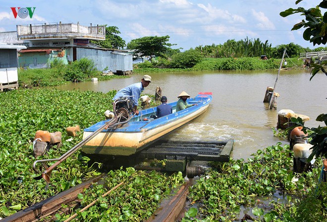 Ảnh: Độc đáo “cầu kéo” phương tiện đường thủy nơi Đất Mũi – Cà Mau - Ảnh 14.