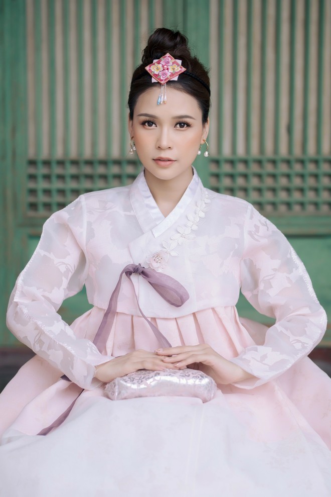 Nhan sắc trong trẻo của Sam khi diện Hanbok, dạo chơi ở Hàn Quốc - Ảnh 11.