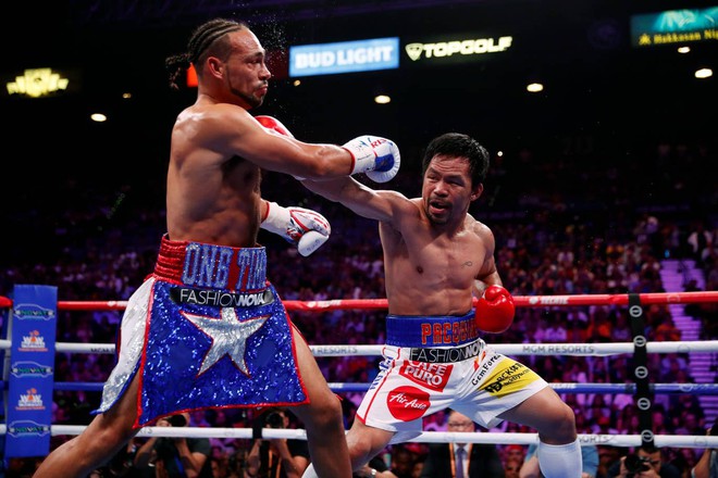 Huyền thoại Manny Pacquiao đánh như lên đồng ở tuổi 40, làm nhà vô địch bất bại người Mỹ phải câm lặng - Ảnh 1.