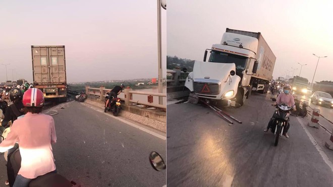 Clip: Thời điểm xảy ra vụ container mất lái tông hàng loạt xe máy trên cầu Thanh Trì - Ảnh 1.